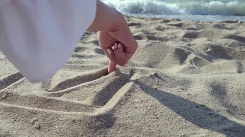 Check mark on the sand Stock Footage 138815493