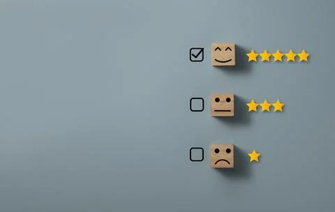 Check mark to select smile face with five stars on blue background Stock Photos