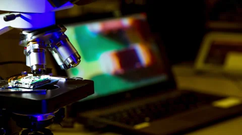 Check micro electronic chip under a microscope Stock Footage 37578821