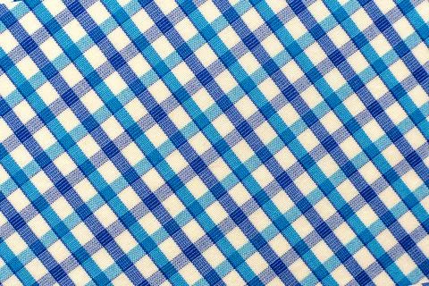 Check plaid seamless pattern. Blue, gray, black background in the cage Stock Photos