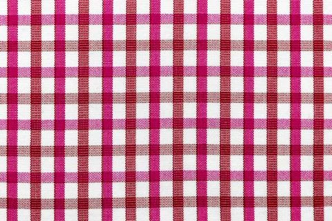 Check plaid seamless pattern. Pink, purple, brown background in the cage. S.. Stock Photos