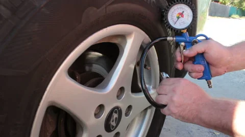 Check The Pressure In The Wheel Stock Footage 61343484