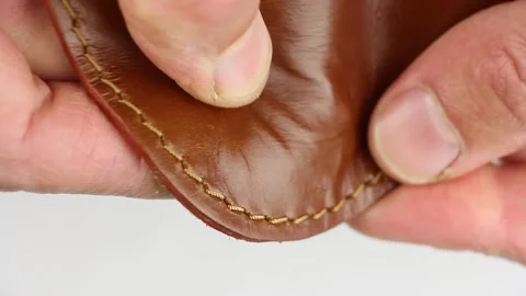 Check quality  of light brown natural smooth shiny glossy leather, close-up Video stock 135290771