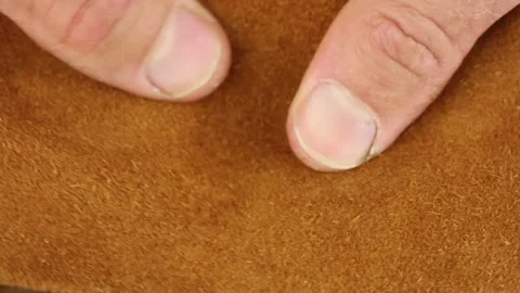Check quality seamy side brown natural leather, close-up macro view Video stock 135290766