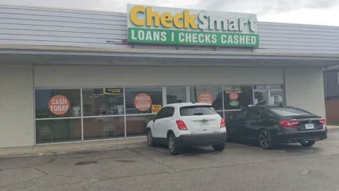 Check Smart - Loans / Checks Cashed Architectural Building Stock Footage 151912437