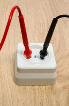 Check the socket for serviceability using the tester. Stock Photos