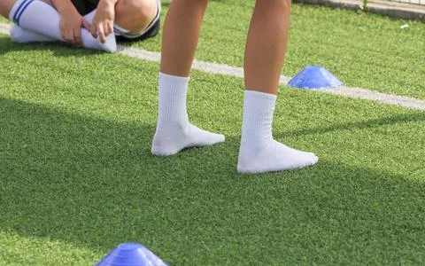 Check, test, valgus foot, flat feet in an athlete, football player Stock Photos