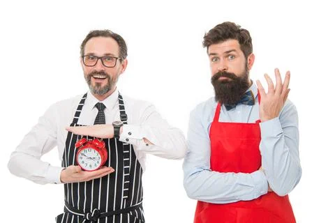 Check what time is it. It is lunch time. Men cooks with alarm clock. Failed Stock Photos