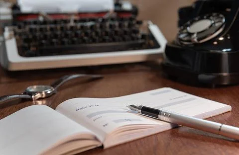 Checkbook, retro typewriter, old telephone, ink pen. lettering in french - .. Stock Photos