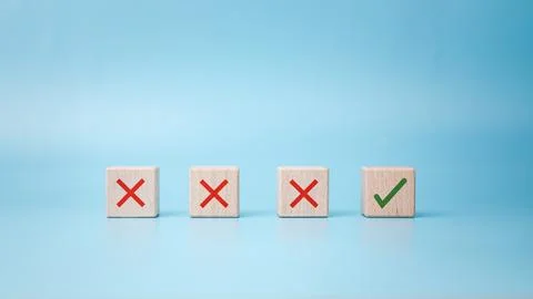 Checkbox with green check mark from row of multiple boxes with red crosses .. Stock Photos
