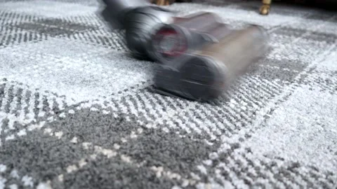 A checked Carpet Being Vacuumed 스톡 동영상 141260795