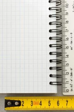 Checked note paper at metal background Stock Photos