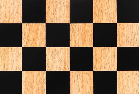 Checkerboard background. Chess background. Chess board close-up Stock Photos
