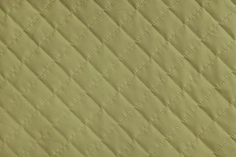 Checkered, diamond stitching pattern, khaki quilted fabric background. Blan.. Foto stock