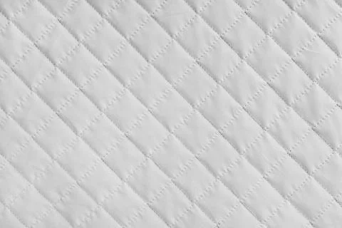 Checkered, diamond stitching pattern, white quilted fabric background. Blan.. 스톡 사진