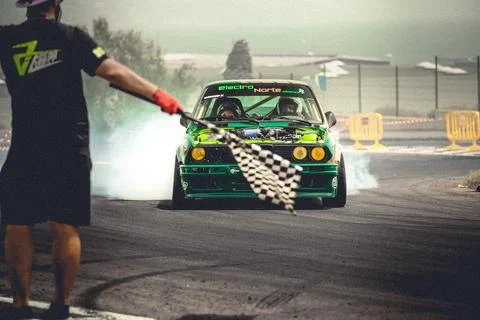 Checkered flag and BMW E30 Stock Photos