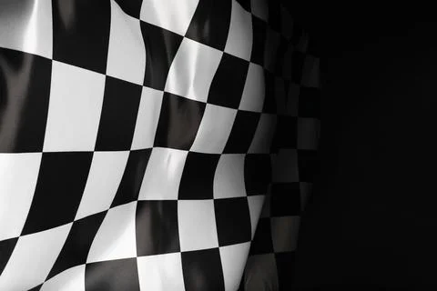 Checkered flag on black background, space for text 写真素材