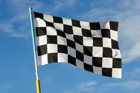 Checkered flag with blue sky Stock Photos