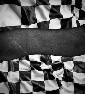 Checkered flag on dark wall Stock Photos