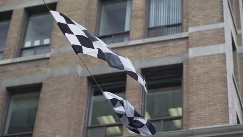 Checkered flag flaps in the wind Stock Footage 188909578