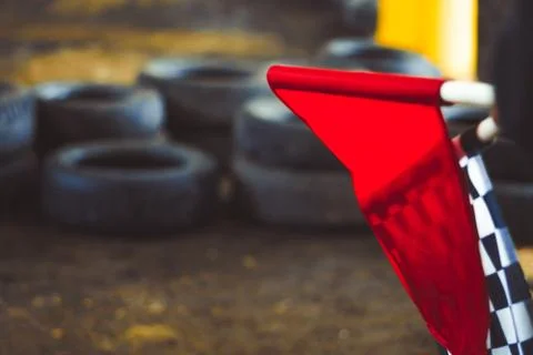 The checkered flag lies Stock Photos
