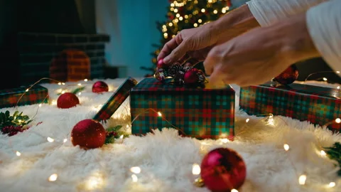 Checkered Gift Box With Baubles And Christmas Lights Stock Footage 320291045