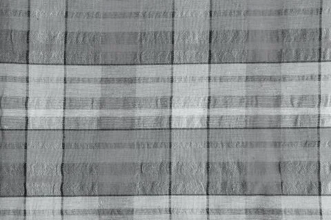 Checkered gray cotton fabric as background texture. Stock Photos