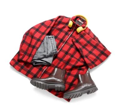 Checkered jacket with leather boots, jeans and headphones on white background Stock Photos