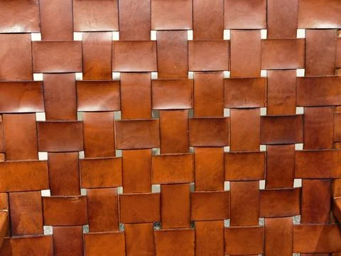 Checkered leather pattern knitted in brown color Stock Photos