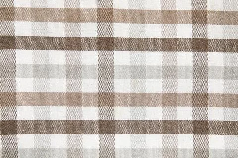 Checkered napkin as background, closeup Stock Photos
