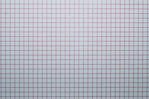 Checkered paper background. square grid. crossing red lines Stock Photos