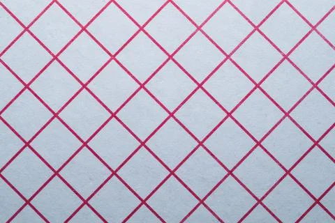 Checkered paper background. square grid. crossing red lines Stock Photos