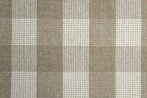 Checkered pattern on  beige fabric, empty surface backdrop Stock Photos