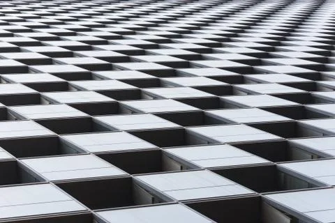 Checkered pattern on a modern building Stock-Fotos