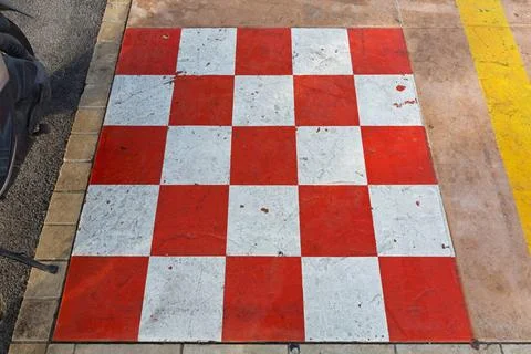 Checkered Pattern Red and White Checkered Pattern Square Painted Pavement ... Stock Photos