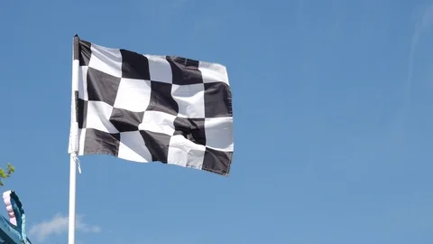 Checkered racing flag shake in the air i... | Stock Video | Pond5