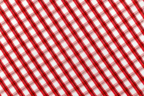 Checkered red fabric. Textile. Checkered fabric background with red and whi.. 스톡 사진