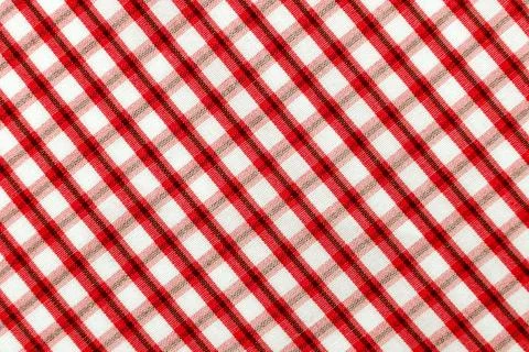 Checkered red fabric. Textile. Checkered fabric background with red and whi.. 스톡 사진