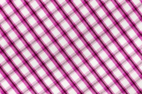 Checkered red fabric. Textile. Checkered fabric background with red and whi.. Stock Photos