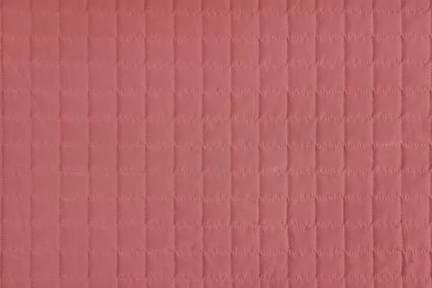 Checkered stitching pattern, red quilted fabric background. Blanket stitch .. Stock Photos