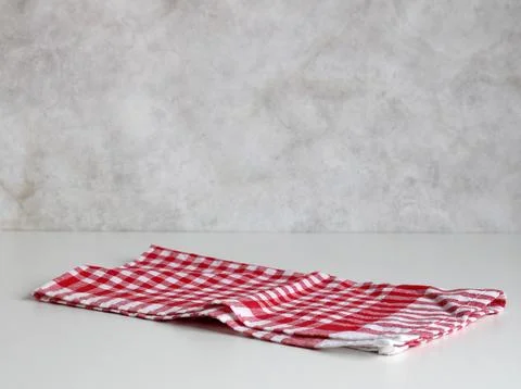 Checkered towel on the table, space for your object. product display. kitchen Stock Photos