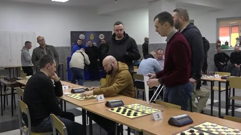 Checkers Game with Spectators – Intense Board Match. Full Shot Stock Footage 332162210