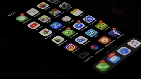 Checkin the weather on an iphone in the dark Stock Footage 106630287
