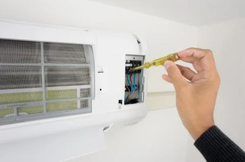 Checking air conditioner Stock Photos