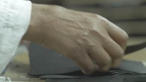 Checking and picking stump leather Stock-Footage 107980004