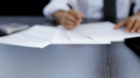 Checking and signing contract Stock Footage 39773572
