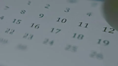 Checking April days on digital calendar on smartphone screen to schedule a Stock-Footage 288964481