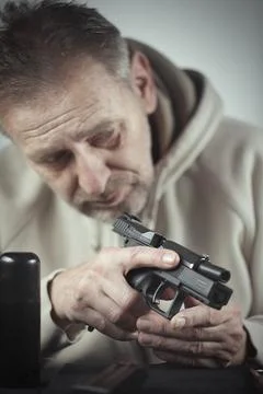 Checking, assembling and disassembling of 9 mm compact handgun Stock Photos