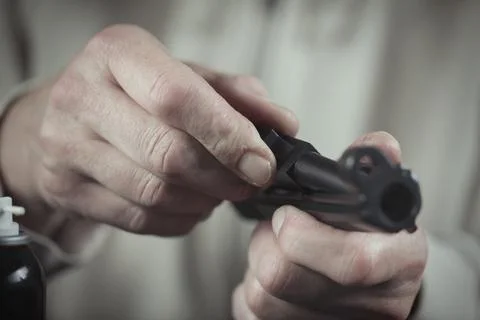 Checking, assembling and disassembling of 9 mm compact handgun Stock Photos