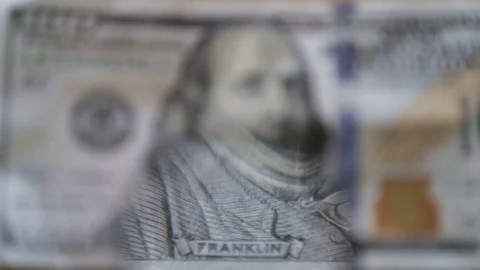 Checking a bank note Stock Footage 77091226